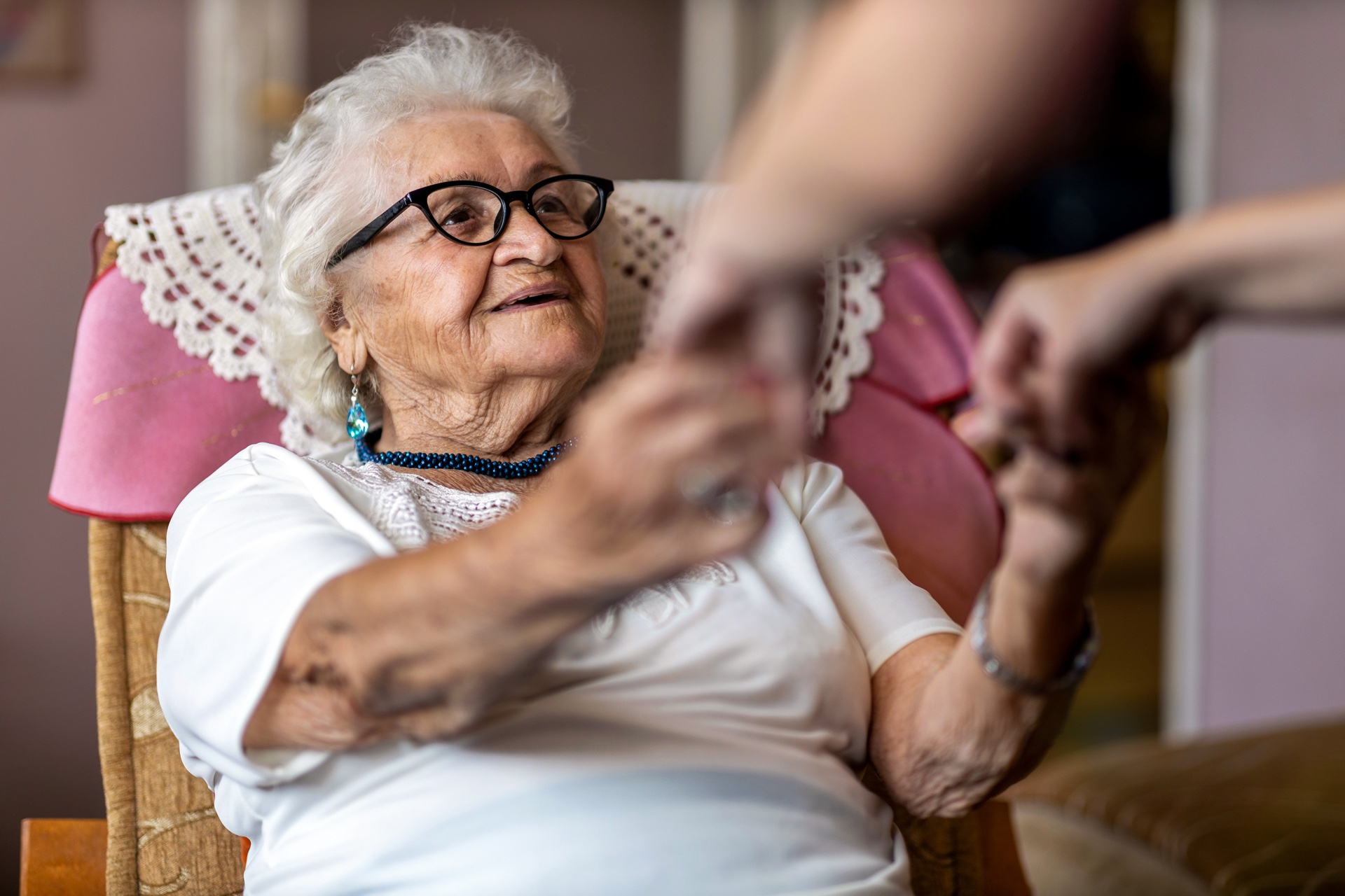 Senior Connection Central Massachusetts - Caregiver helping senior at home